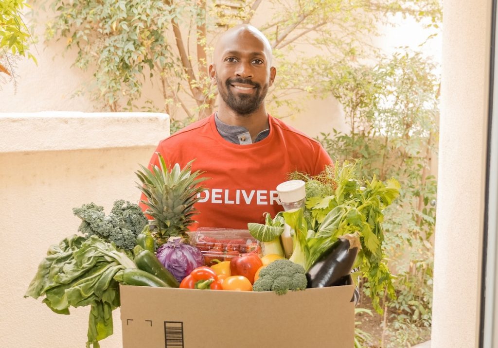 man delivering vegetables