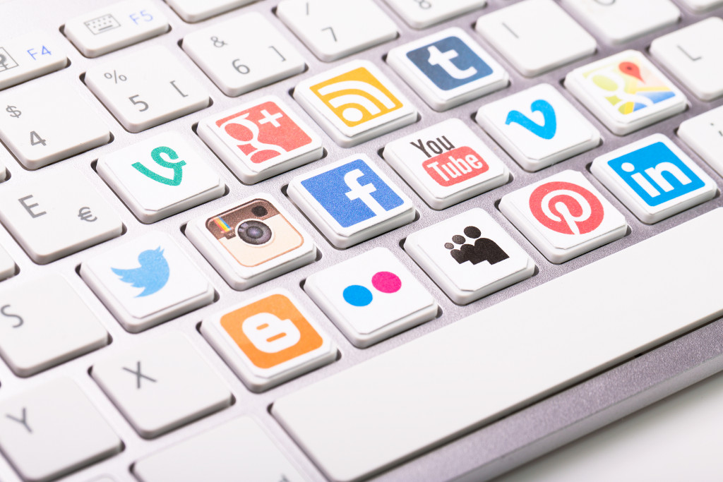 different social media platform printed on keyboard