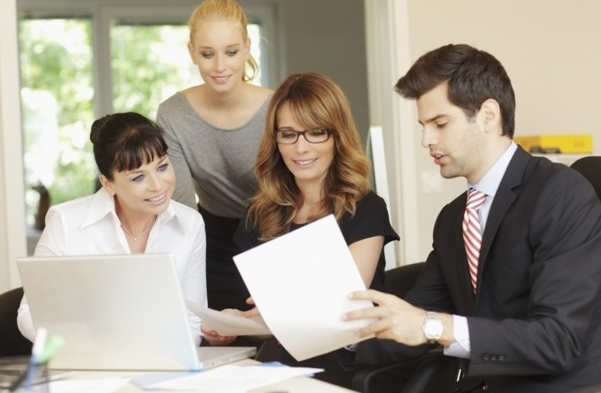 business meeting in office with discussion between business people