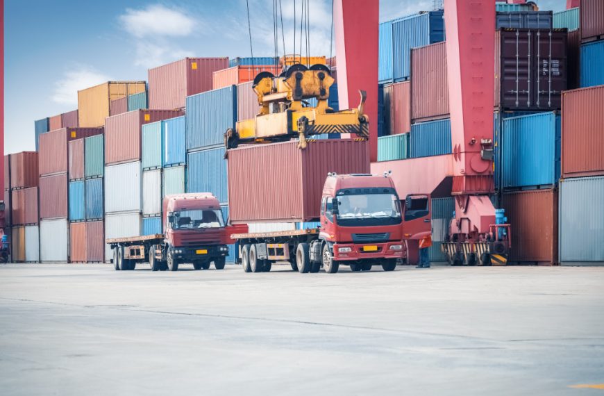 Cargo containers being loaded to a truck