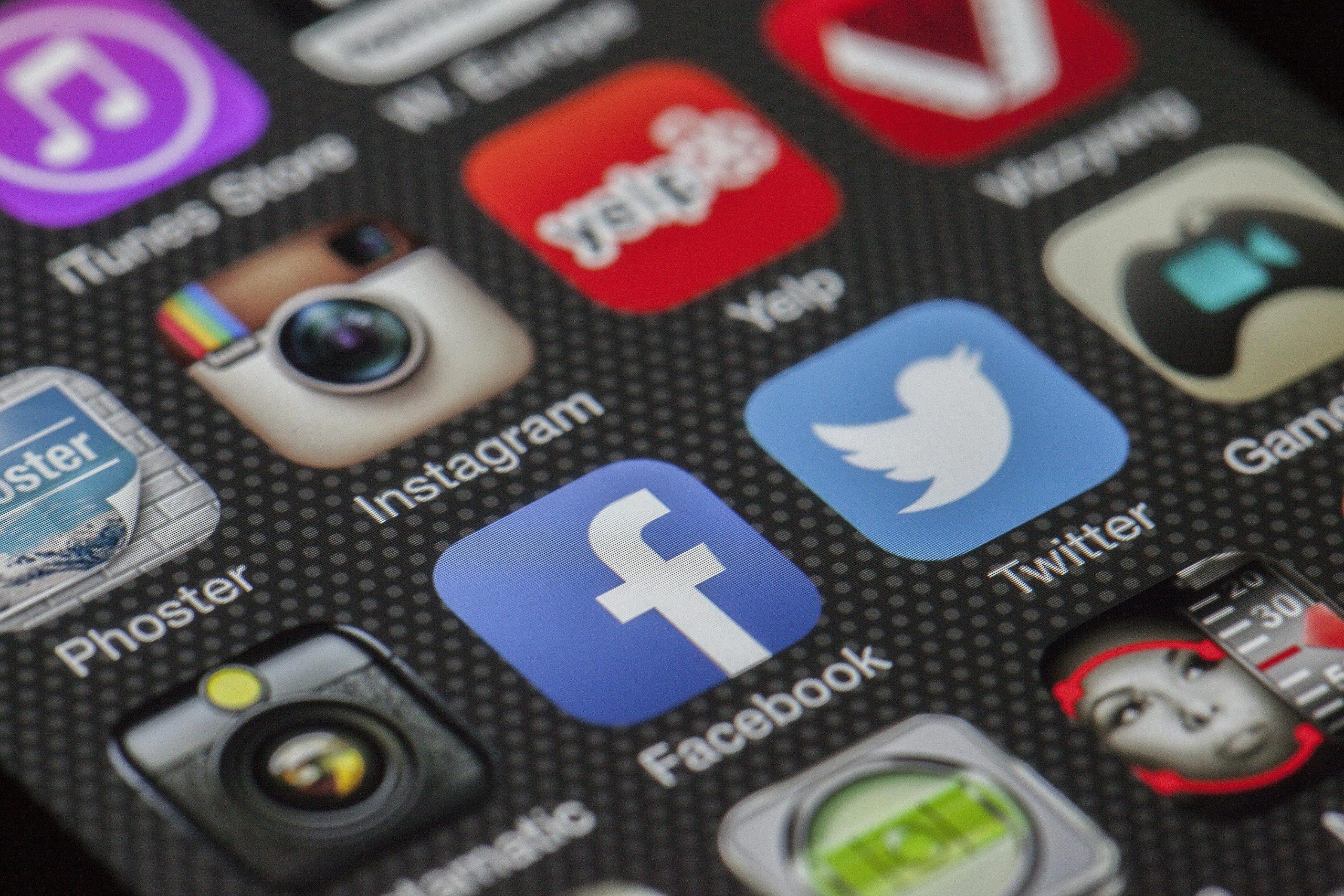 close-up of social media icons, including facebook and instagram